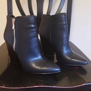 Pointed toe booties